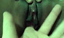 The skinny ebony girl smiles as she spreads her shaved pussy for the camera