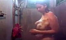 i'm watchin this sexy indian babe latherin her curvy chubby body in the shower, those big wet tits bouncin