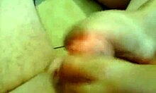 Watch This MILF Suck And Footjob Him To Cum!