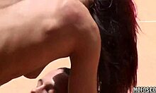 redhead vixen sunbathing by the pool