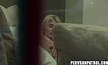 Big boobed blonde slips two fingers into shaved pussy, giving blowjob in POV voyeur scene.