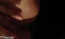 Look at that busty babe playing with her tits!