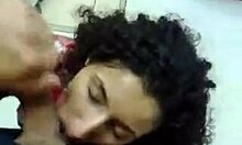 Horny curly brunette slut sucks big fat dong clothed in pov