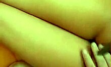 Playful brunette girlfriend masturbates on bed