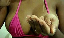 ebony girl shows oiled tits on webcam