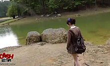 Punky teen flashes outdoors and plays with banana