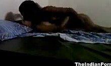 Watch this horny Indian couple fucking and kissing on their bed at home.