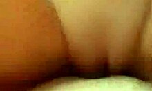 Playful brunette girlfriend masturbates on bed