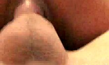 Seductive amateur girlfriend kneels to give steamy oral to her partner with fake tits.