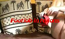 Does the dude drop a big load on his girlfriend's sexy feet?