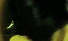 Darkish Doll Making Eye Contact While Enjoying Homemade Fun