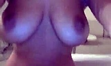 tanned brunette dancing solo on stage