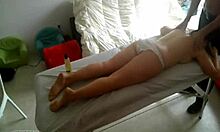 Curvy naked amateur chick receives intense fingering on her ass during massage