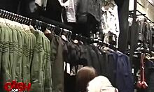 Lascivious brunette performs oral in changing room