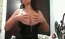 Homemade video shows a sexy brunette in black lingerie