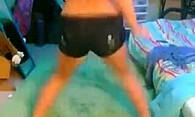 teen hottie dances in shorts, exposing her ass on webcam