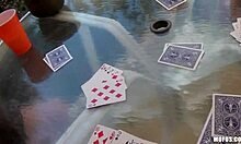 A guy films an amateur foursome by the pool, watching the girls suck and fuck in doggystyle.