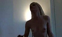 Very pale girl takes photos of her body in the mirror