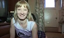 Girl warms up her partner for sex by performing fellatio in miniskirt