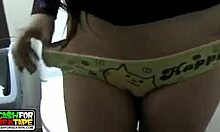 Jaunty gal with cute tat flashing her twat