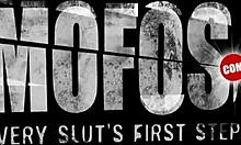 tanned babe in apron about to suck cock