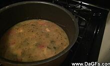 Colorful Babe Eats Snickers While Baring Her Breasts