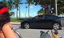 daring brunette flashes tits and sucks cock outdoor on scooter