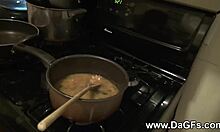 Colorful Babe Eats Snickers While Baring Her Breasts