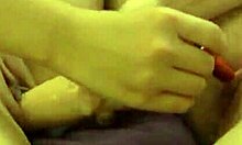 look at these two naked redhead and asian cuties making out, now they're using dildos for lesbian fun