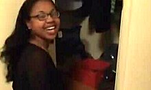 Ebony hoe with glasses using her tits in amateur porno