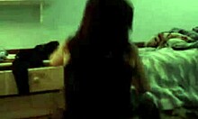 Brunette girl in stockings and panties poses on webcam