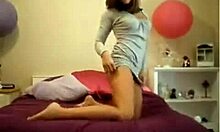 sweet latin teen 18+ strips in front of the camera in bedroom