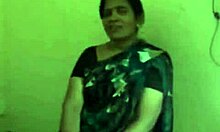 Busty Indian skank gets cum on her face.