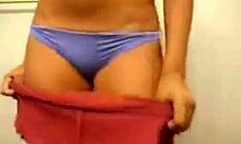 teen solo cam show exposing her abnormally hot ass in socks and miniskirt