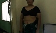 Busty Indian skank gets cum on her face.