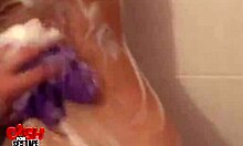 in the shower, cute brunette hottie uses her long thong while giving blowjob to big cock