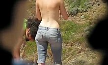 damn, caught this hottie changing clothes on the beach! 😍