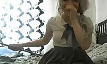 Lusty teen blondie teases guys on webcam in stockings from bed
