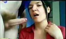 Black-Haired Woman In Red Shirt Gives Oral