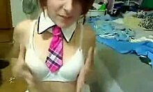 fun little 18+ slut rubbing her clitoris over her red panties.