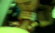 alluring inked brunette on knees sucking cock pov