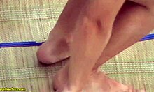 Close-Up Shots of a Busty Brunette MILF at the Beach