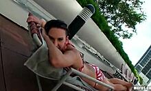 Brown-haired gal masturbates hard on bed edge