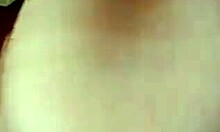 cheerful gal proudly displaying her cute features in the mirror