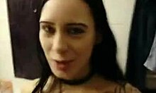 alluring inked brunette on knees sucking cock pov