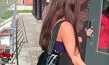 Fella takes photos of chick during outdoor activity.