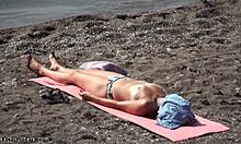 Dirty Pervert Spies on Half-Naked Tanned Babe Sunbathing on Beach