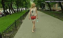 Open-Minded Blonde Walking Around Streets Totally Barefoot