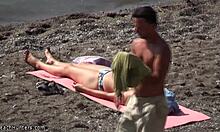 Dirty Pervert Spies on Half-Naked Tanned Babe Sunbathing on Beach
