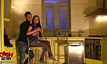 Doll with long dark hair on her knees giving blowjob in kitchen 😍